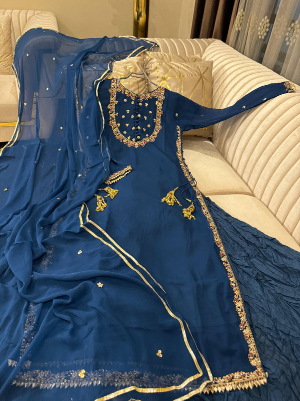 Wedding collection 
Chifon hand work stone dbka & pearl work long shirt wd crushsilk shrara & chifon gota & pearl work dopta
Small medium only
Shirt length 49
Price 7500/-